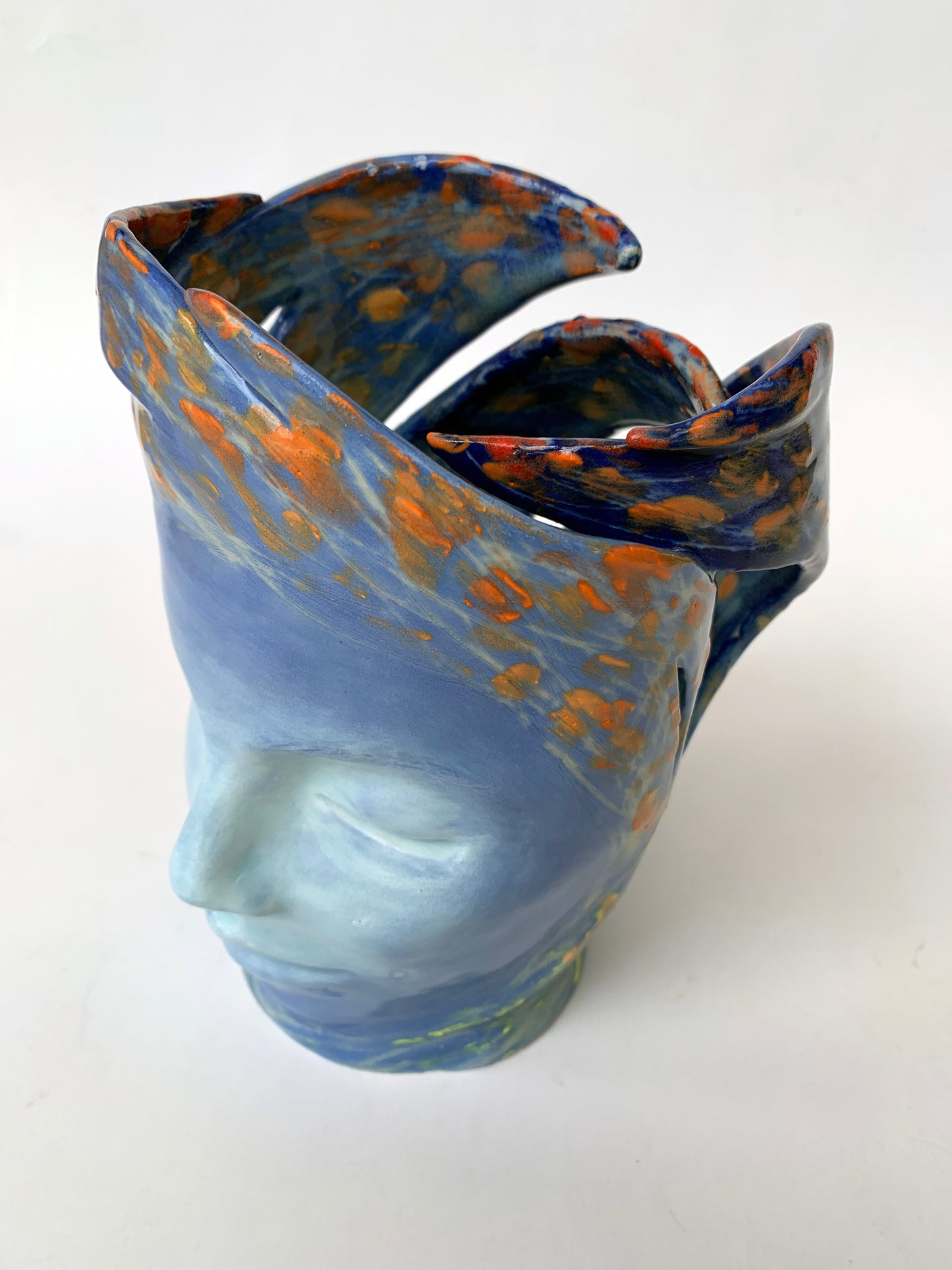 "Diving Deep" Ceramic Sculpture by Porschia Denning 6" (w) x 8" (h)